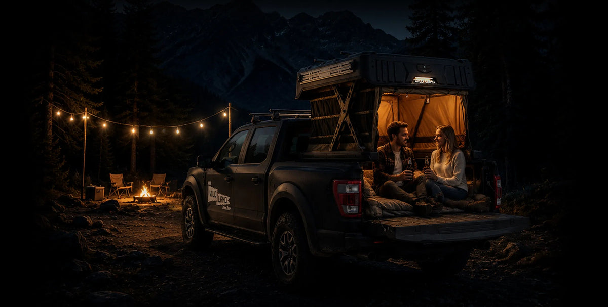 PickupMate WinTopper open on a pickup at an evening campsite